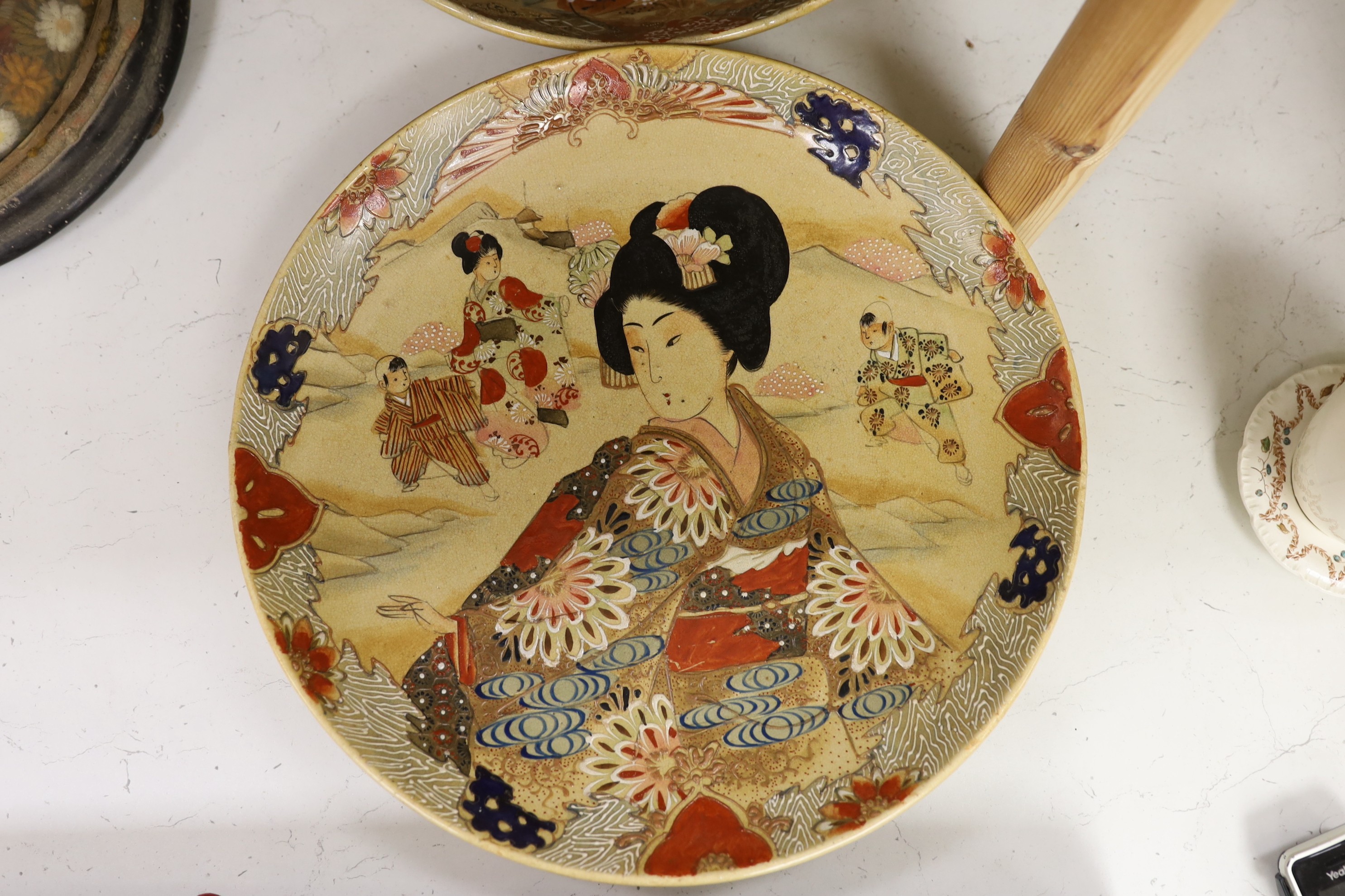 Two Japanese Satsuma pottery chargers. Largest 37cm diameter